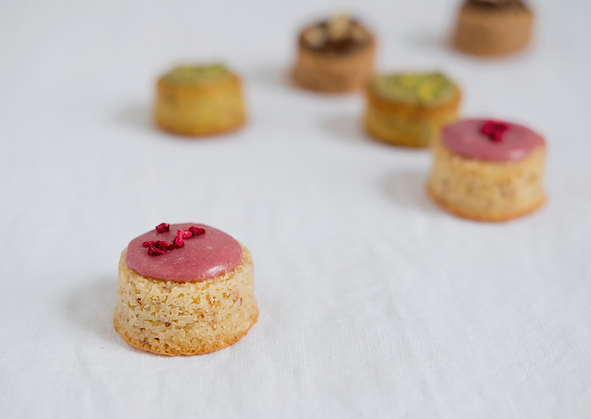 Selection of small canape style almond cakes with icing