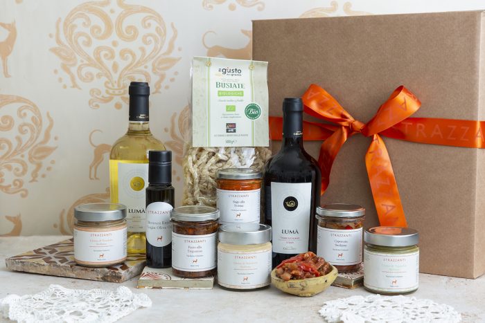 Food hamper of products from Sicily including olive oil, pasta, pistachio cream, caponata & more.