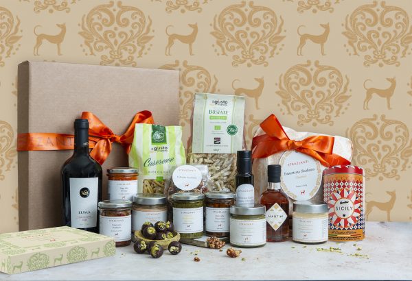 A food hamper filled with Sicilian produce include Panettone, coffee, truffles, pesto, olive oil, pasta & more.